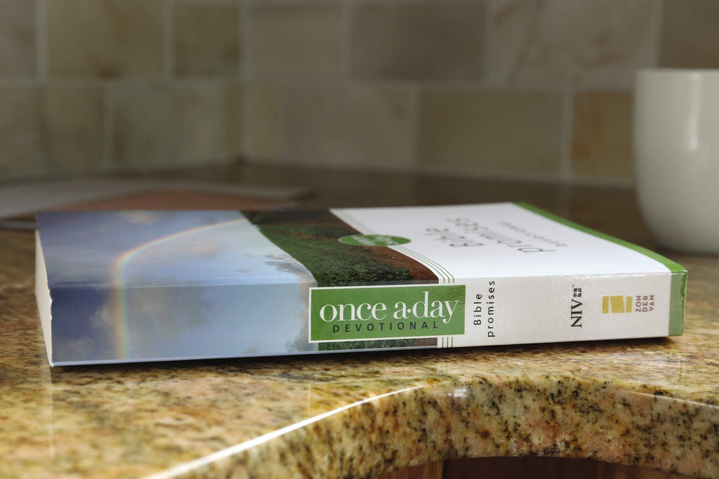 Once-A-Day Promises Devotional Bible in NIV translation, a paperback edition for spiritual growth