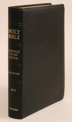The NIV Scofield Study Bible III in black leather bound edition, perfect for in-depth Bible study and analysis.