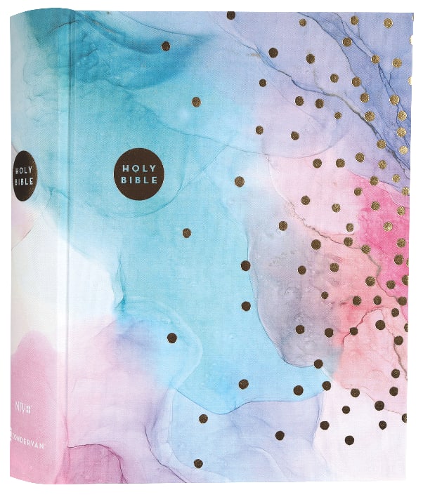Girl reading from multi-color NIV Bible with red letter edition