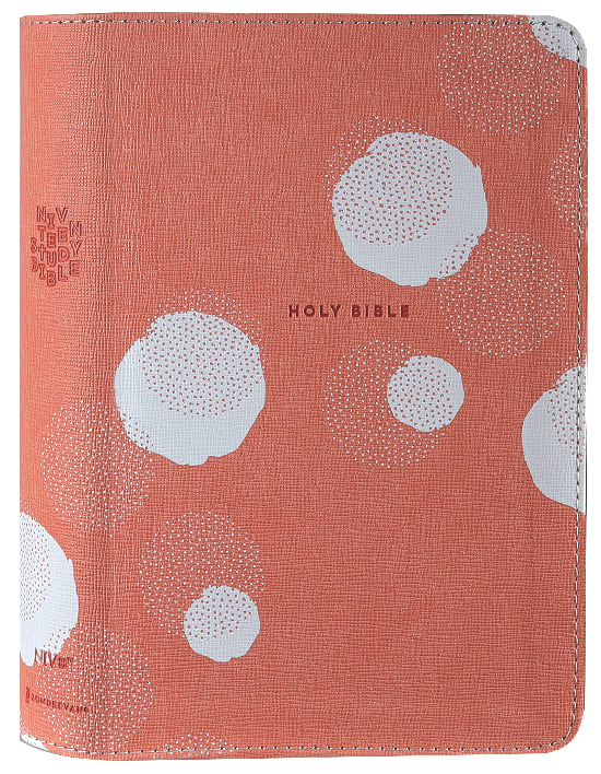 Close-up of Compact NIV Teen Study Bible in Peach Comfort Print with study notes and comfortable design.