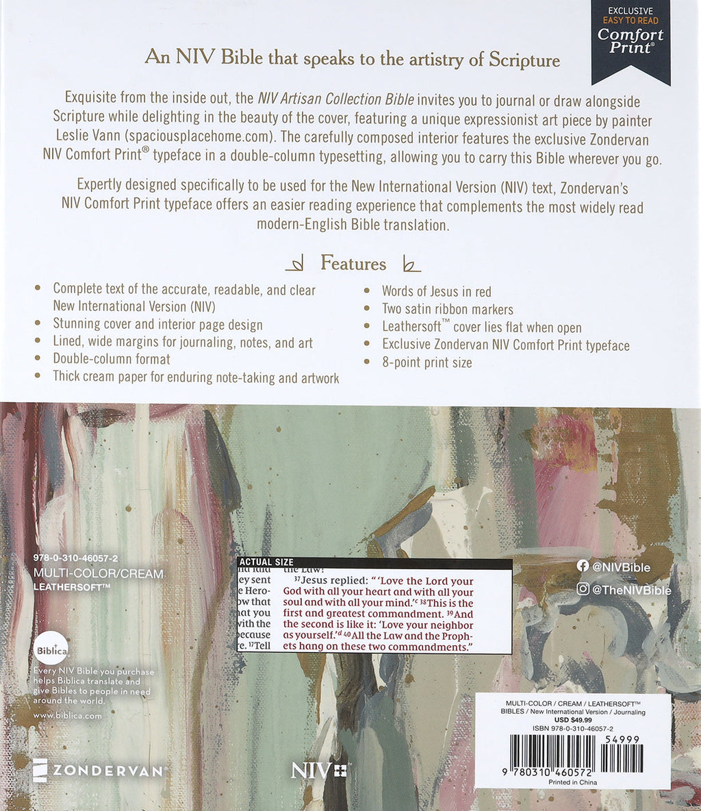 Close-up of NIV Artisan Collection Bible cover with multi-color and cream accents.