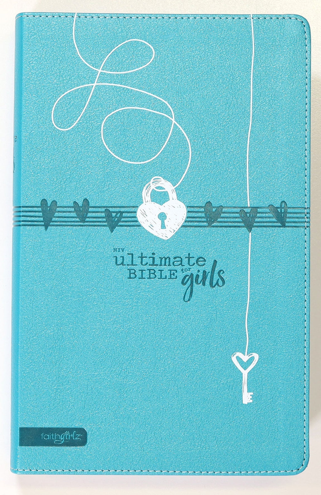 NIV Ultimate Bible for Girls Faithgirlz Edition, teal cover, indexed tabs.