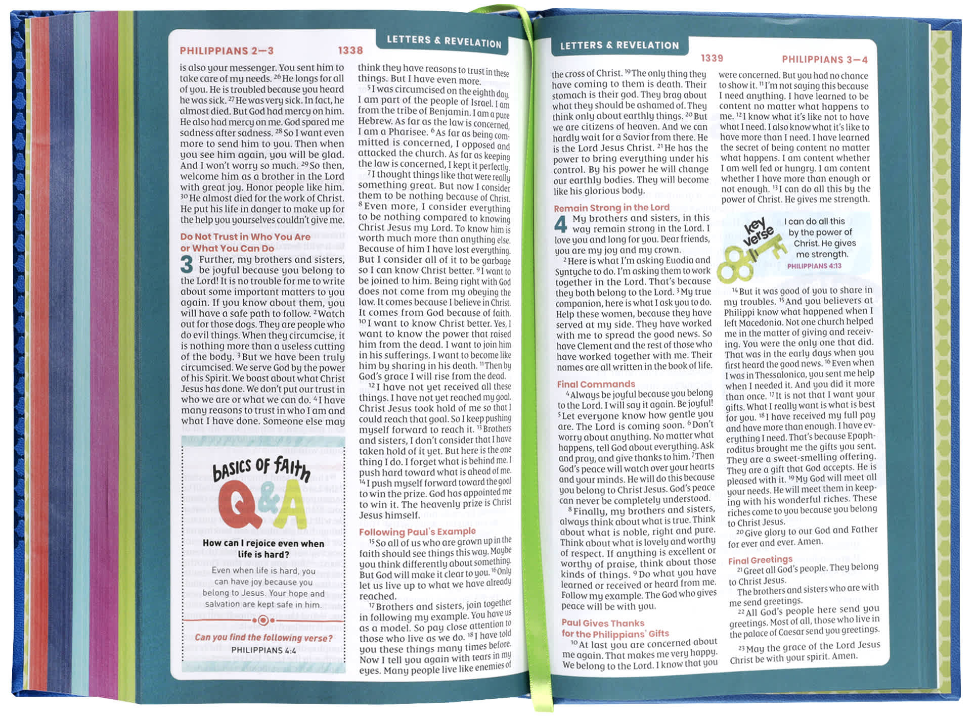 NIRV Tiny Theologians Bible, Blue, a compact Bible featuring the New International Reader's Version, open on a desk