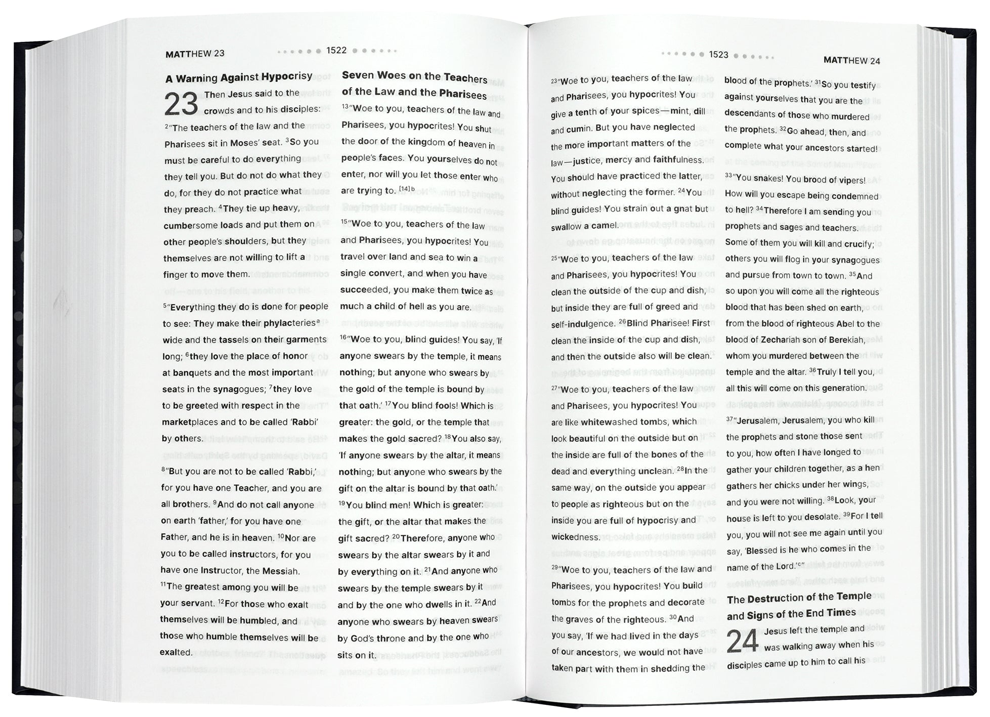 NIV Clear Focus Bible with charcoal and copper cover, open to scripture