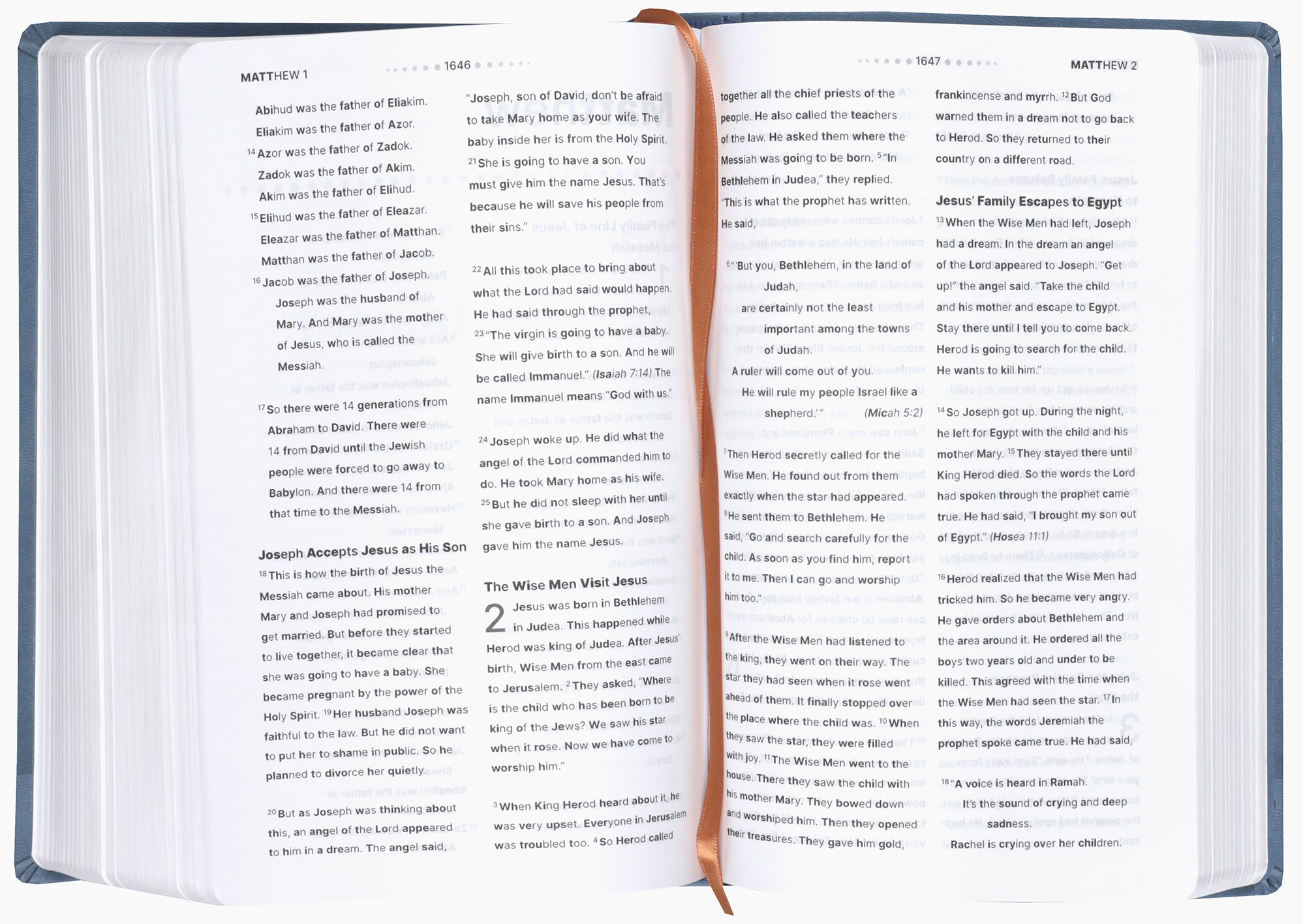 Open pages of the NIRV Clear Focus Bible for Kids, Blue, showing engaging stories and lessons
