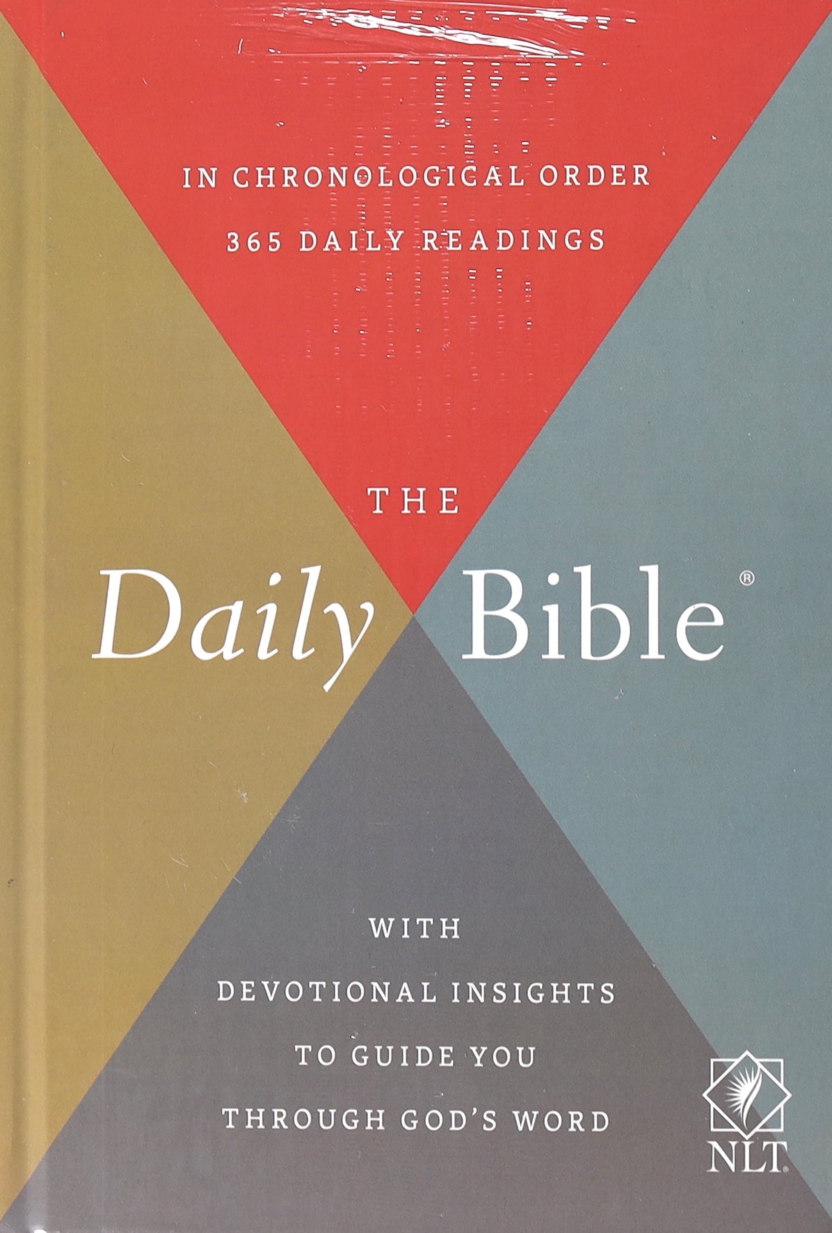 Daily devotional journal featuring the New Living Translation Bible.