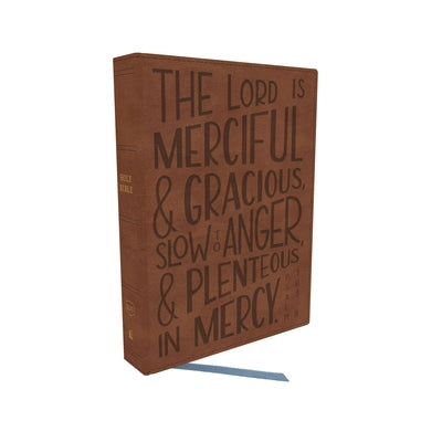 A KJV Bible with a brown leather cover, featuring verse art and a journaling space for reflection and prayer.