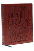 A KJV Bible with a brown leather cover, featuring verse art and a journaling space for reflection and prayer.