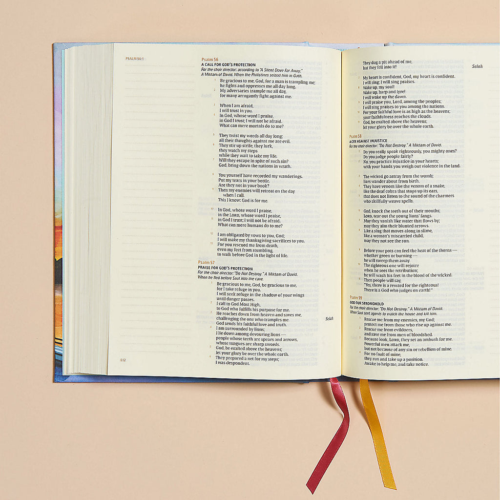 CSB Hosanna Revival Notetaking Bible showcases a peaceful lake landscape for Bible study and journaling purposes.