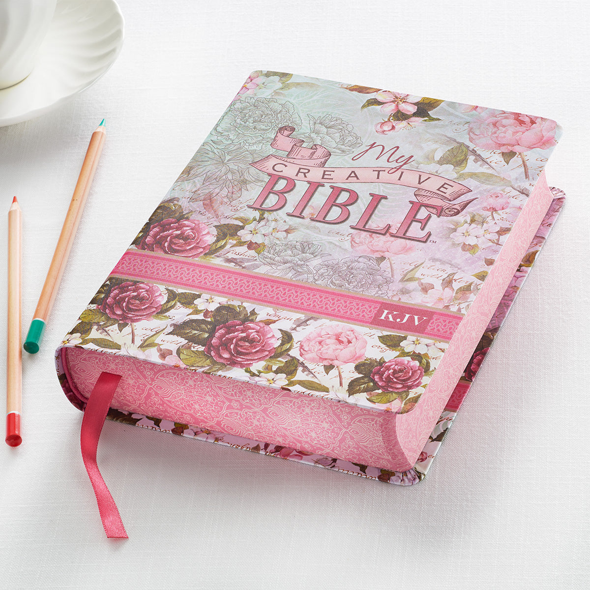 KJV My Creative Bible Silky Floral (Black Letter Edition) journal open to a blank page, ready for inspirational writing.