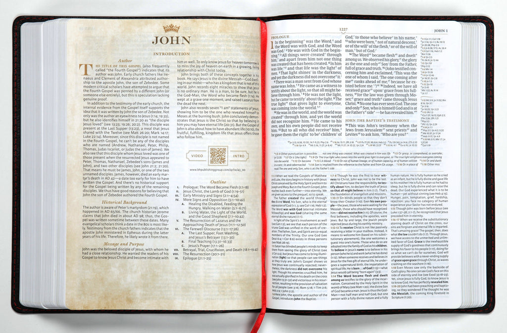 CSB Tony Evans Study Bible Black (Black Letter Edition) open on a nightstand