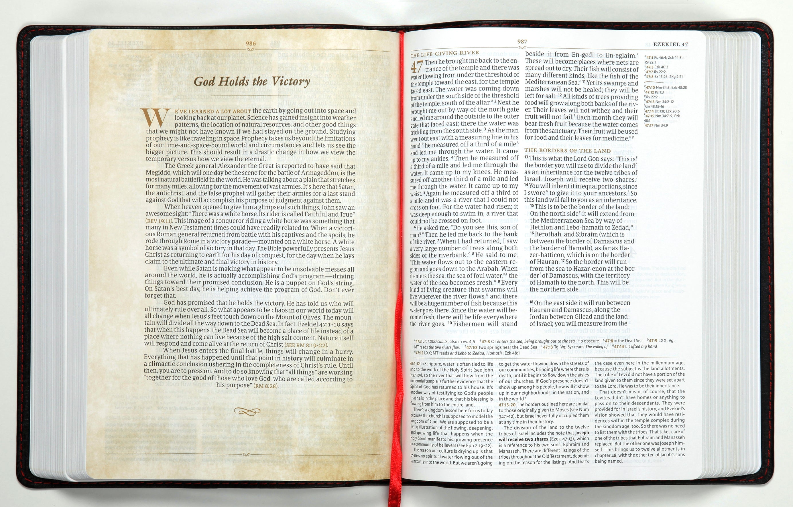 CSB Tony Evans Study Bible Black (Black Letter Edition) on a luxurious desk