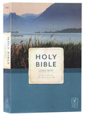 New Living Translation Economy Outreach Bible in large print with black lettering.