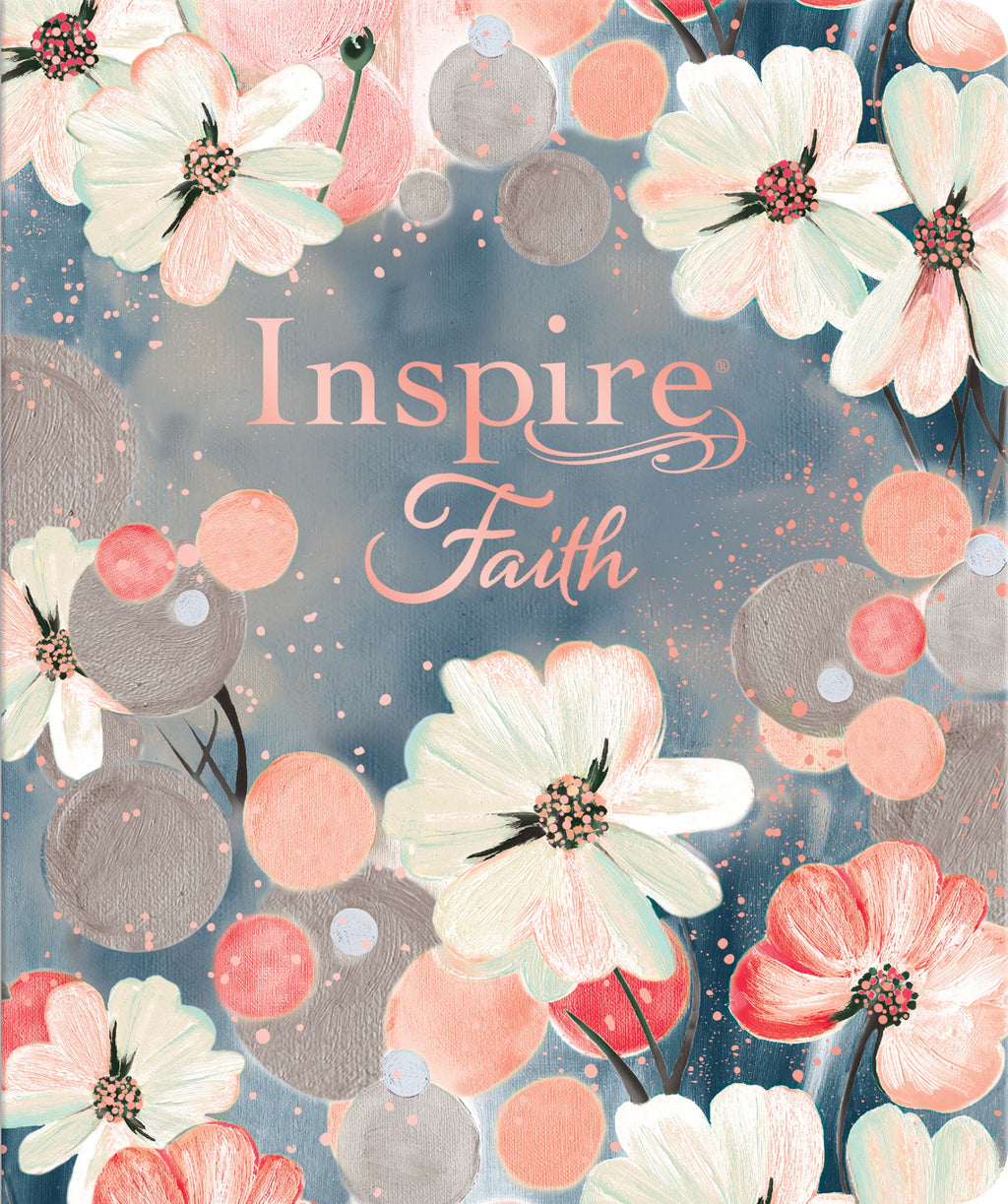 Close-up of the Inspire Faith Bible watercolor garden devotional journal with a stunning watercolor background.