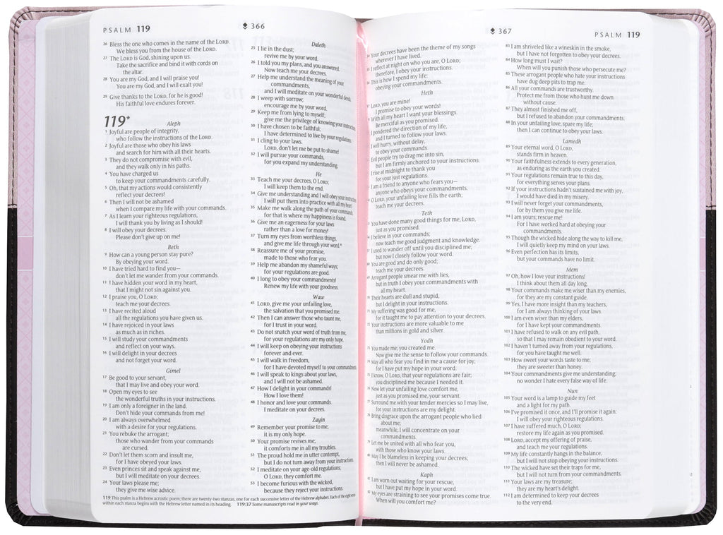 Front cover of NLT Premium Gift Bible showcasing red letter edition design and pink and dark brown color scheme.