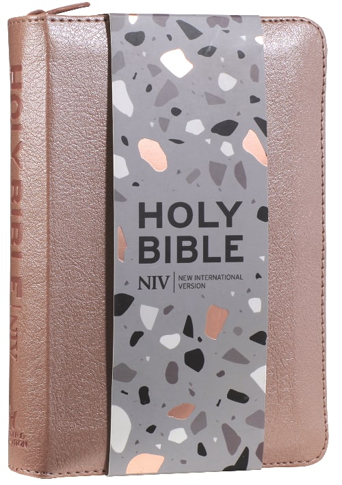 Close-up of rose gold NIV pocket Bible with zipper