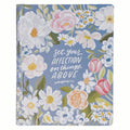 Black letter edition KJV journaling Bible with blue floral cover.