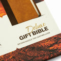 The Message Deluxe Gift Bible | Christia + NIV Medium Polyurethane Cross Black | Ch Combo