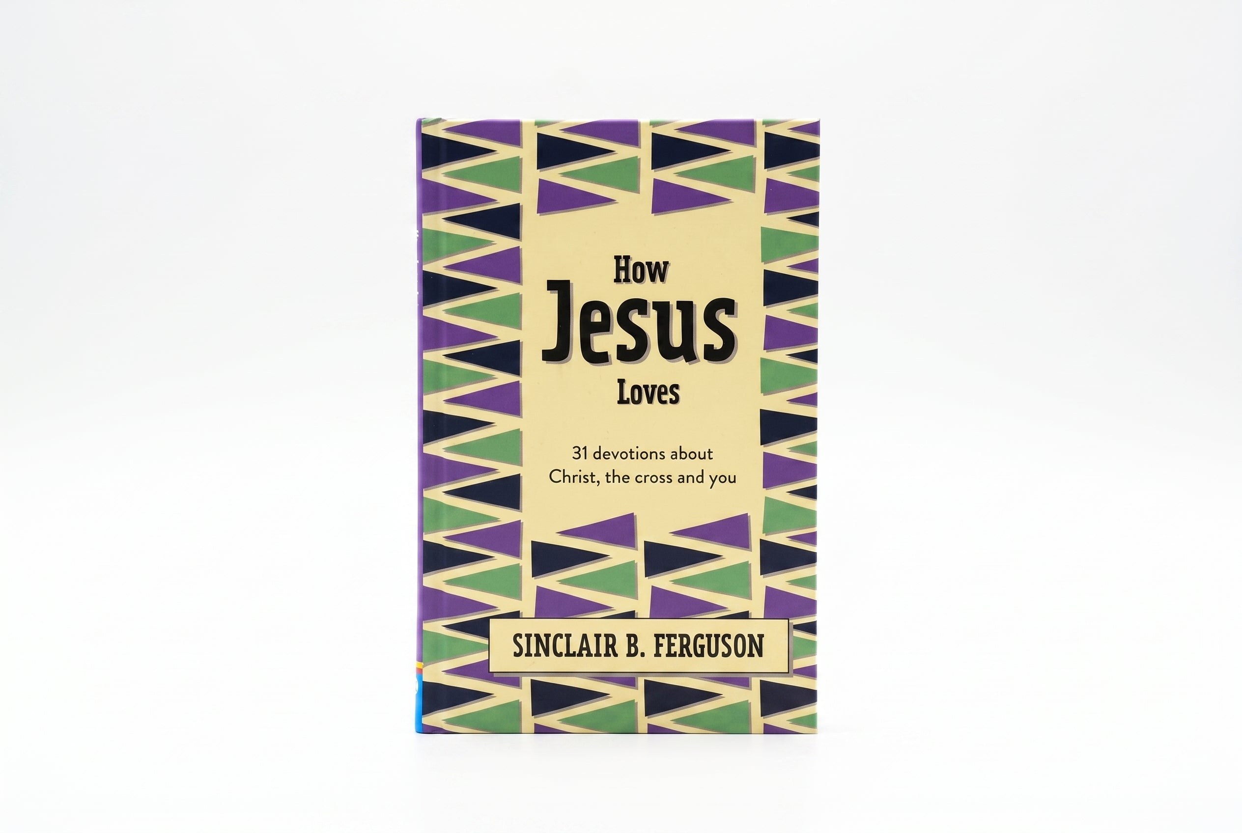 Studio photo of How Jesus Loves: 31 Devotions about Christ, the Cross and You in hero