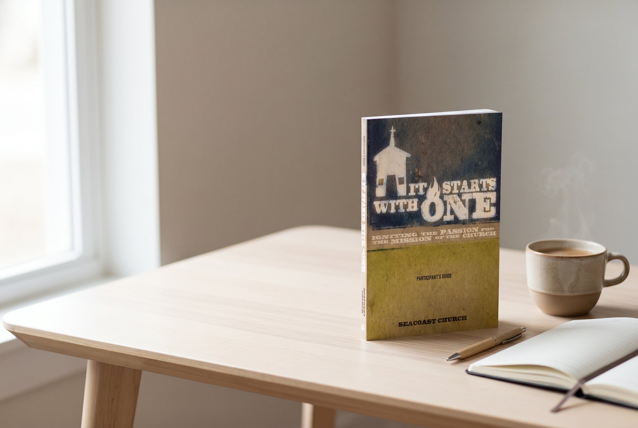 Studio photo of It Starts with One Participant's Guide in lifestyle